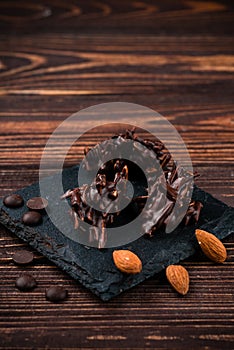 almonds in dark chocolate close up