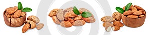 Almonds nuts with leaves isolated on white background with clipping path and full depth of field. Set or collection