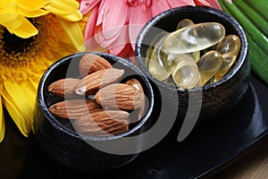 Almonds and oil capsules