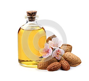 Almonds oil with nuts on white backgrounds