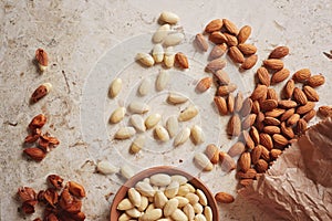 Almonds, unshelled and shelled photo