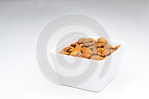 Almonds in white bowl