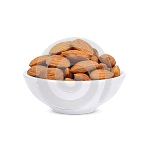 Almonds in a white cup isolated on white background