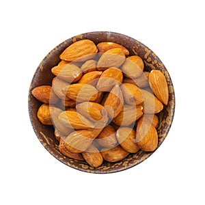 Almonds in wooden bowl isolated on a white background