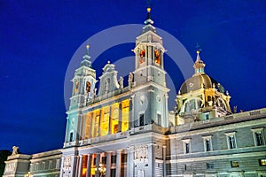 Almudena Cathedral facade at sunset in Madrid, Spain