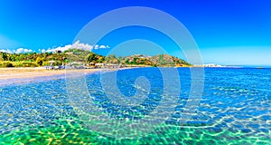 Almyros Beach, Crete, Greece: Nature landscape view of beautiful beach and sea in a sunny day close to Agios Nikolaos