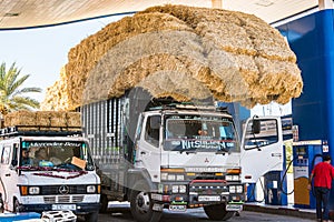 Alnif, Morocco - October 11, 2013. Car loaded by straw bales
