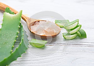 Aloe Vera gel closeup. Sliced Aloevera leaf and gel, natural organic cosmetic ingredients for sensitive skin, alternative medicine