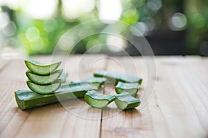 Aloe vera gel on wooden table