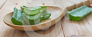 Aloe vera gel on wooden table