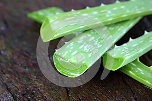 Aloe Vera leaves on wooden