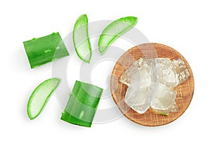 Aloe vera sliced in wooden spoon isolated on white background. Top view. Flat lay