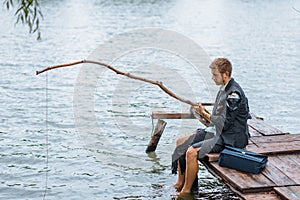 Alone businessman fishing on lost island