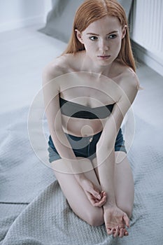 Alone girl with anorexia problem