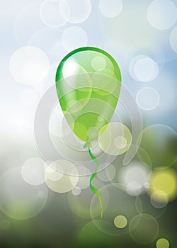 Alone glossy green balloon on natural spring blurred bubbles bac