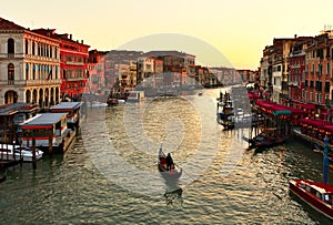 Alone gondola at sunset. Grand Canal in Venice