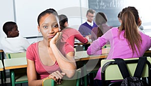 Alone outcasted student being mobbed by other students