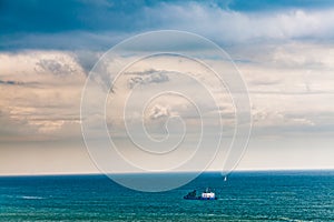 Alone ship in blue sea