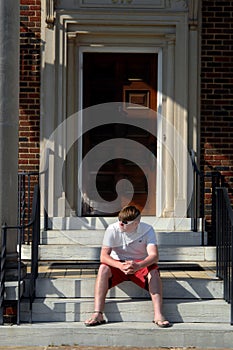 Alone on steps of dorm