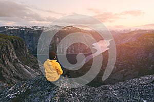 Alone tourist on Trolltunga rock