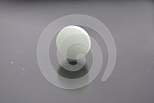 Alone white round tablet