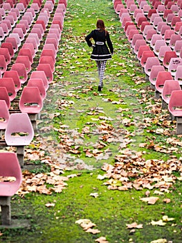 Alone woman in auditorium