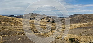 Along the road from San Pedro de Tiquina to Copacabana on the Titicaca lake, the largest highaltitude lake in the world 3808m photo