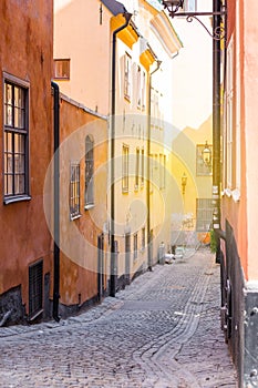 Along the streets of The Old Town, Gamla Stan in Stockholm, Sweden. Summer day