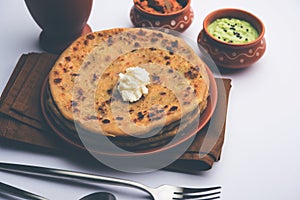 Aloo Paratha / Indian Potato stuffed Flatbread. Served with fresh fresh Lassi / Lassie or buttermilk