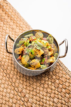 Aloo shimla mirch sabji or dry Potato Capsicum curry is an indian main course recipe