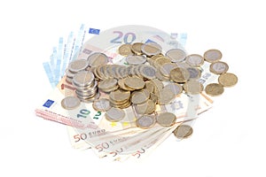Alot of coins and euro bills isolated photo