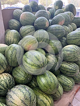 Alot of watermelon in market for sell photo