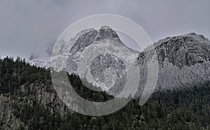 Alp mountains covered with fresh snow in autumn in canton Uri in Switzerland.