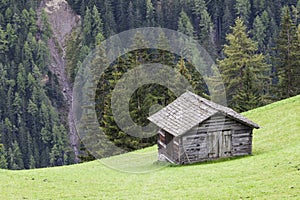 Alp shed on a slope