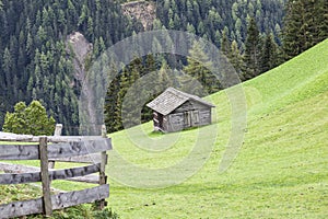 Alp shed on a slope