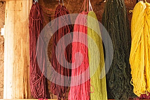 Colourful Alpaca Wool, drying on the wall, Peru