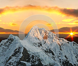 Alpamayo peak on sunset photo