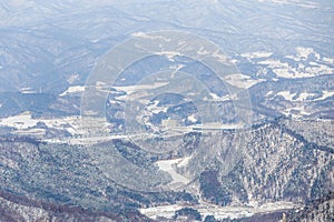 Alpencia, South Korea, 2016, Winter - Top View. Alpencia ski and biathlon center among snow-capped mountains