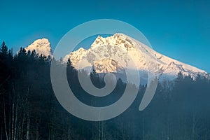 Alpenglow on snowcapped Watzmann mountain