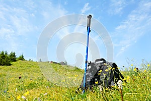 Alpenstock and backpack photo