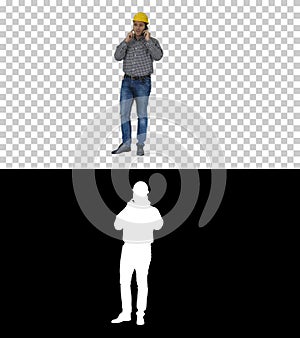 Construction worker using smartphone, Alpha Channel