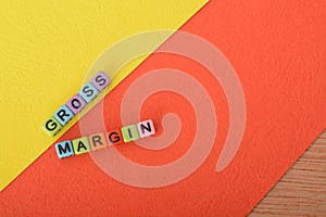 Alphabet beads with text GROSS MARGIN. Alphabet beads with text GROSS MARGIN