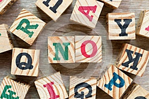 Alphabet block in word no with another on wood background