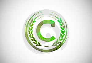 Alphabet C sign with a wheat wreath. Polygonal low poly organic wheat farming logo concept. Agriculture logo design vector