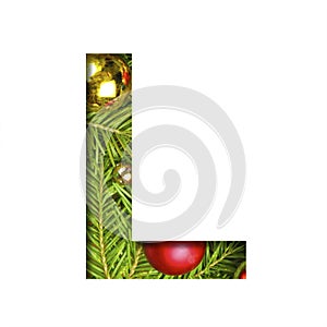 Alphabet on Christmas tree. The letter L cut out of paper on a background fresh ï¿½hristmas tree with colored balls. Set of
