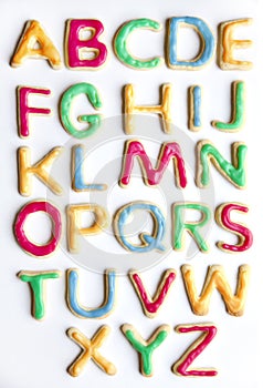 Alphabet in decorated colourful cookies