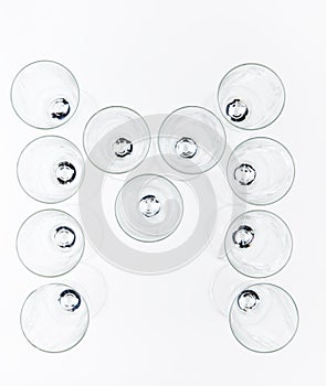 Alphabet Empty champagne glass white background