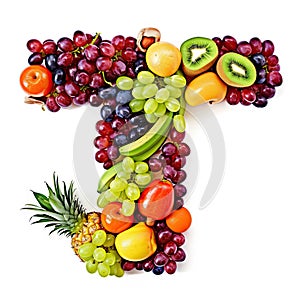 Alphabet of healthy food. Letter T made of many fruits. Green, red grape, kiwi, banana, berries, pineapple, apple on
