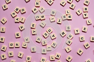 Alphabet letters on pink background