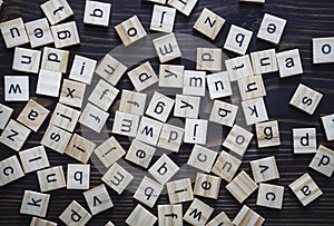 Alphabet letters on wooden scrabble pieces